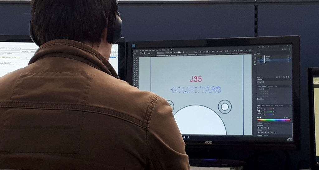 Protocase graphics specialist Josh Currie works on a customer's order