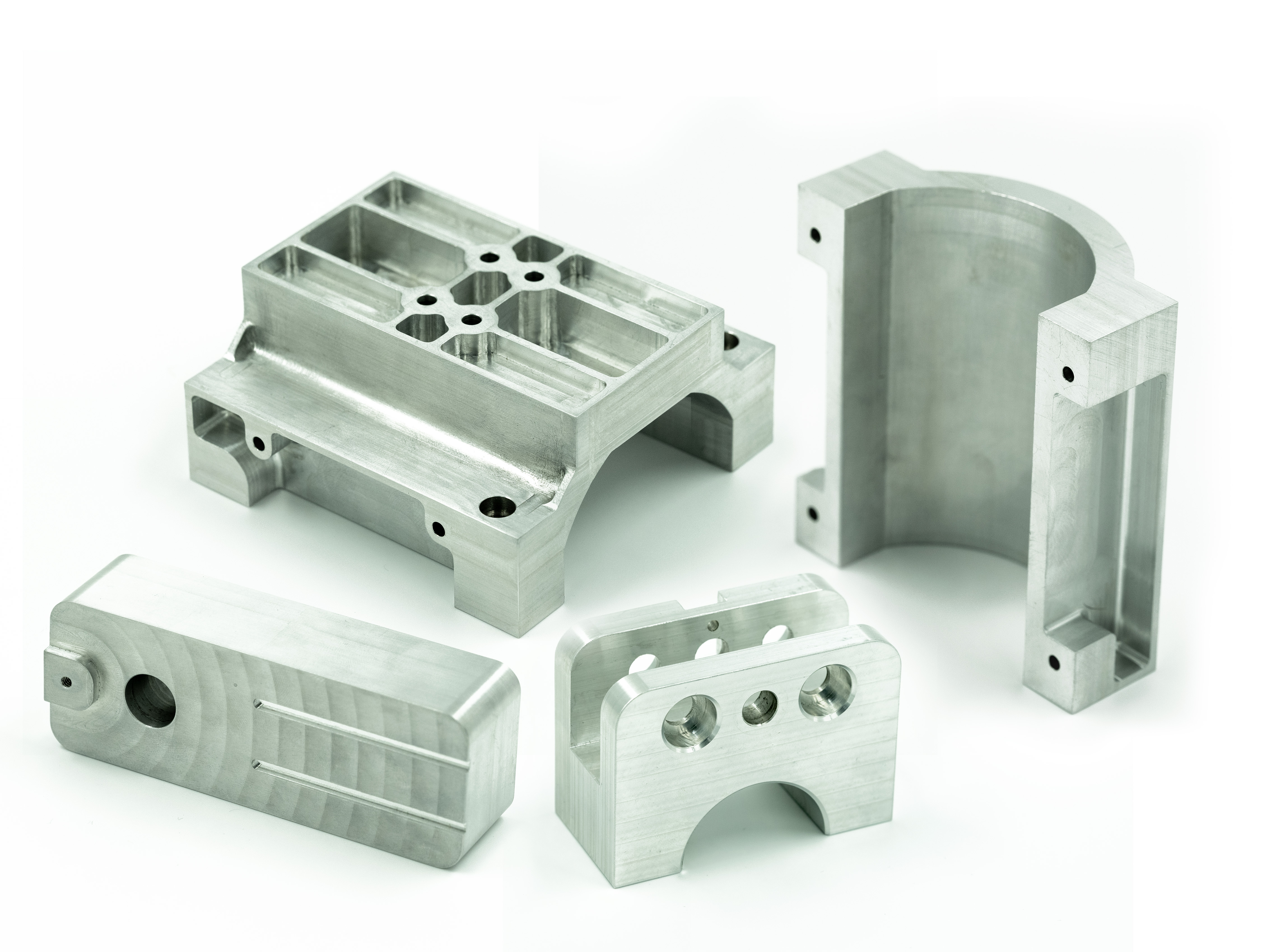 a collection of CNC machined parts